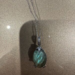 Elegant Labradorite Pendant Necklace with diamond bail and setting.